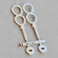 Clé de sellette double (1:20)